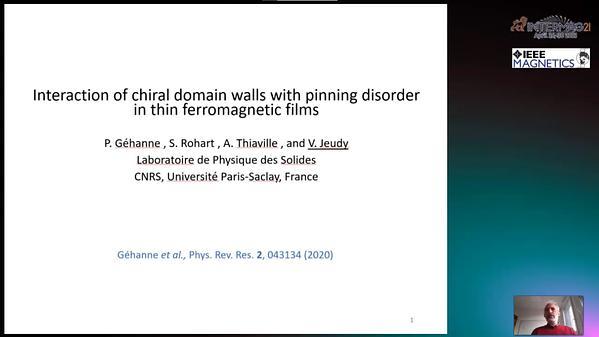 Interaction of chiral domain walls with pinning disorder in thin ferromagnetic films