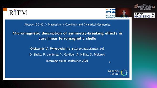  Micromagnetic description of symmetry-breaking effects in curvilinear ferromagnetic shells