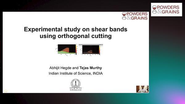 An experimental study on shear bands in sand using the orthogonal cutting setup