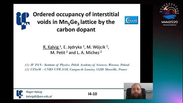 Ordered occupancy of interstitial voids in Mn5Ge3 lattice by the carbon dopant