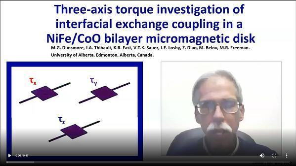 Three-axis torque investigation of exchange bias in a micromagnetic disk