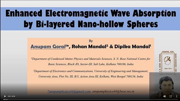 Enhanced Electromagnetic Wave Absorption by Bi-layered Nano-hollow Spheres