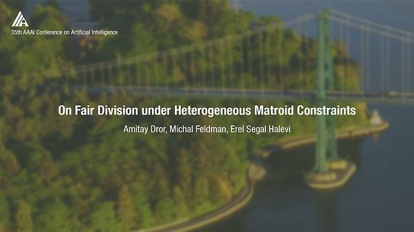 On Fair Division under Heterogeneous Matroid Constraints