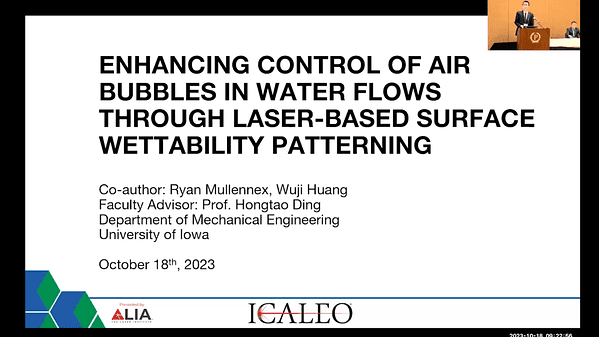 Enhancing Control of Air Bubbles in Water Flows through Laser-based Surface Wettability Patterning