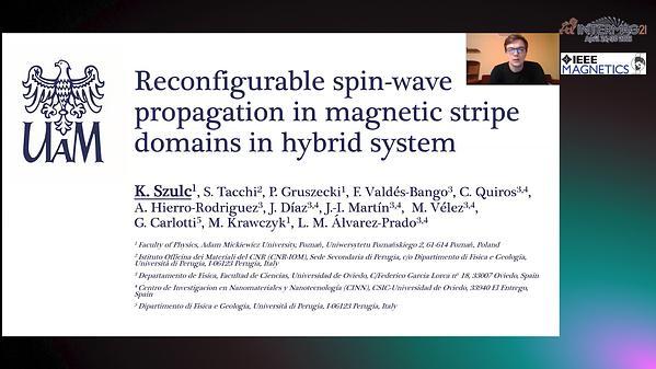  Reconfigurable spin-wave propagation in magnetic stripe domains in hybrid system