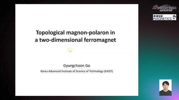  Topological magnon-polaron in a two-dimensional ferromagnet