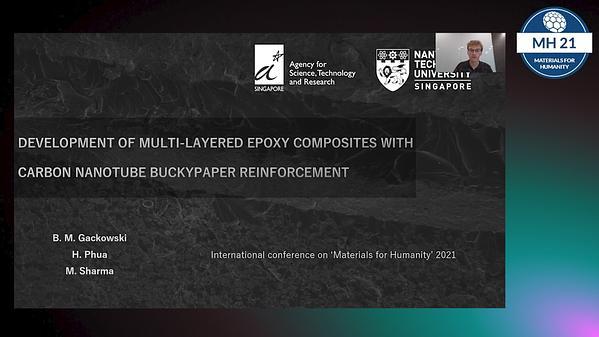 Development of multi-layered epoxy composites with carbon nanotube buckypaper reinforcement