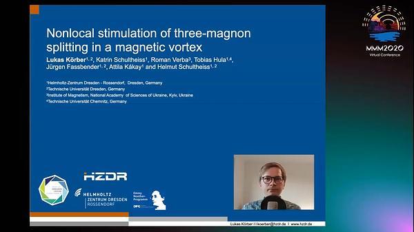 Nonlocal stimulation of three-magnon splitting in a magnetic vortex