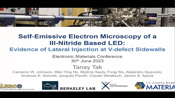 Electron Emission Microscopy of an Electrically Driven III-Nitride-Based LED: Evidence of Lateral Electron Injection at V-Defect Sidewalls
